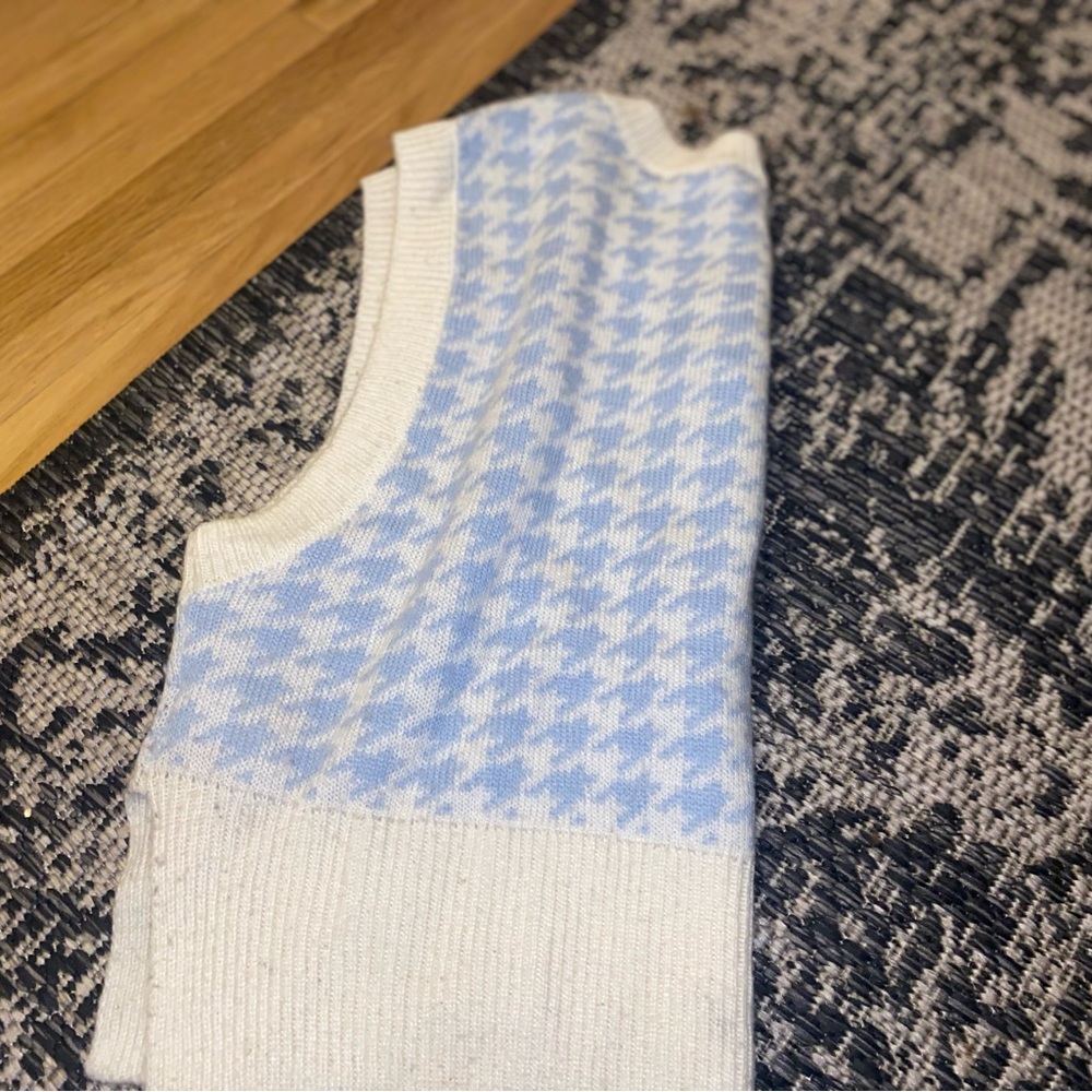 Blue and white sweater vest